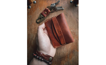 The leather card holder for debit, credit and id cards is completely made by hand.